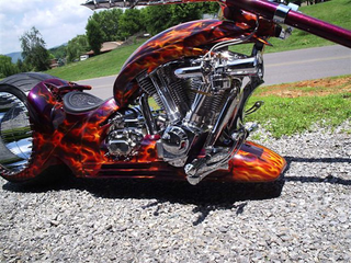 Illustration for article titled Hubless Monster Motorcycle Rolls Without Spokes